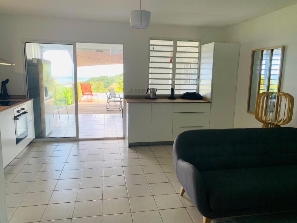 Kuchyň nebo kuchyňský kout v ubytování Villa Fresh&Cosy Trois-Ilets 3 étoiles