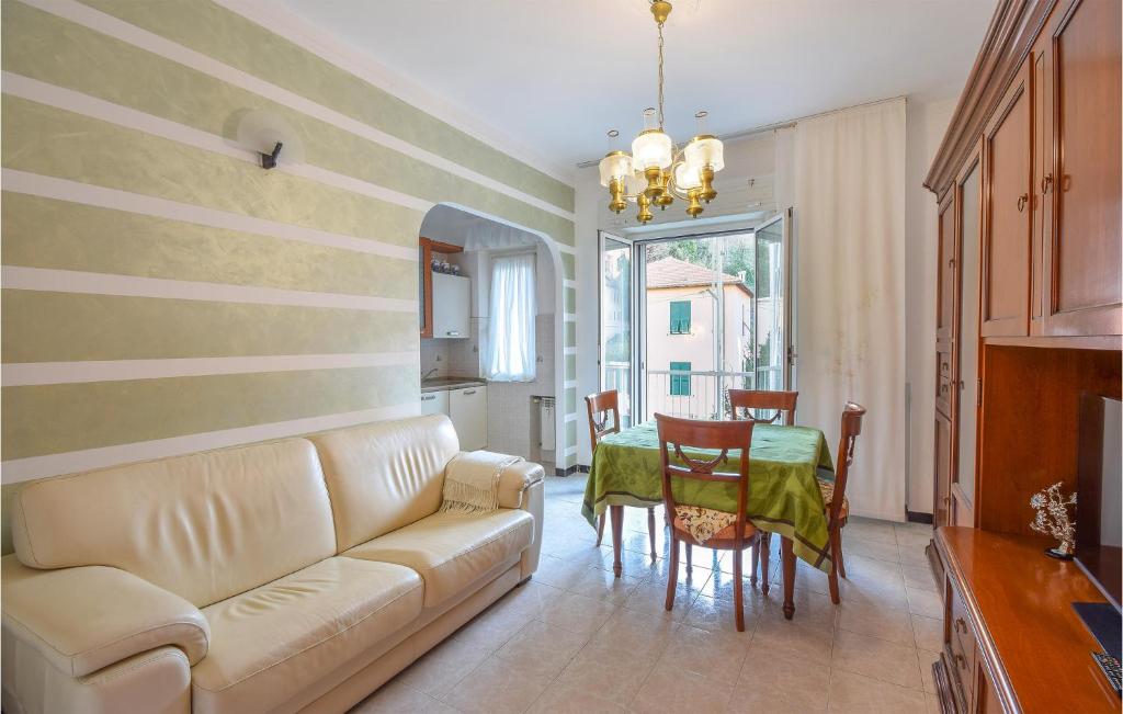 A seating area at Amazing apartment in Genova with 2 Bedrooms