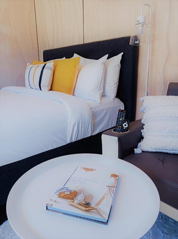 Letto o letti in una camera di Snowman Cabins