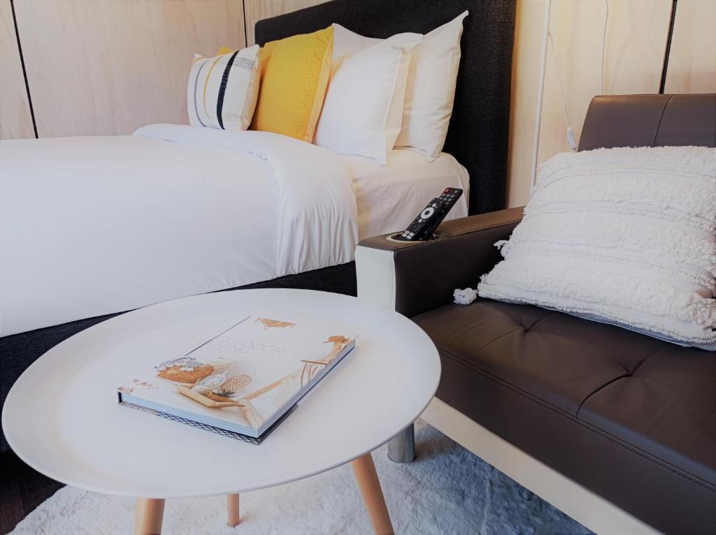 Letto o letti in una camera di Snowman Cabins