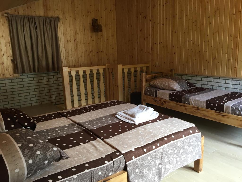 Postel nebo postele na pokoji v ubytování Cottages in mountains