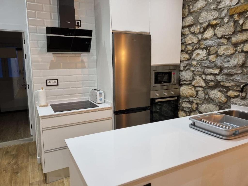 Kuchyň nebo kuchyňský kout v ubytování 119A - Espectacular apartamento en pleno centro