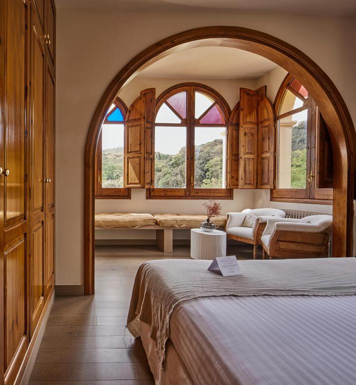 Postel nebo postele na pokoji v ubytování Mas Salagros EcoResort & SPA