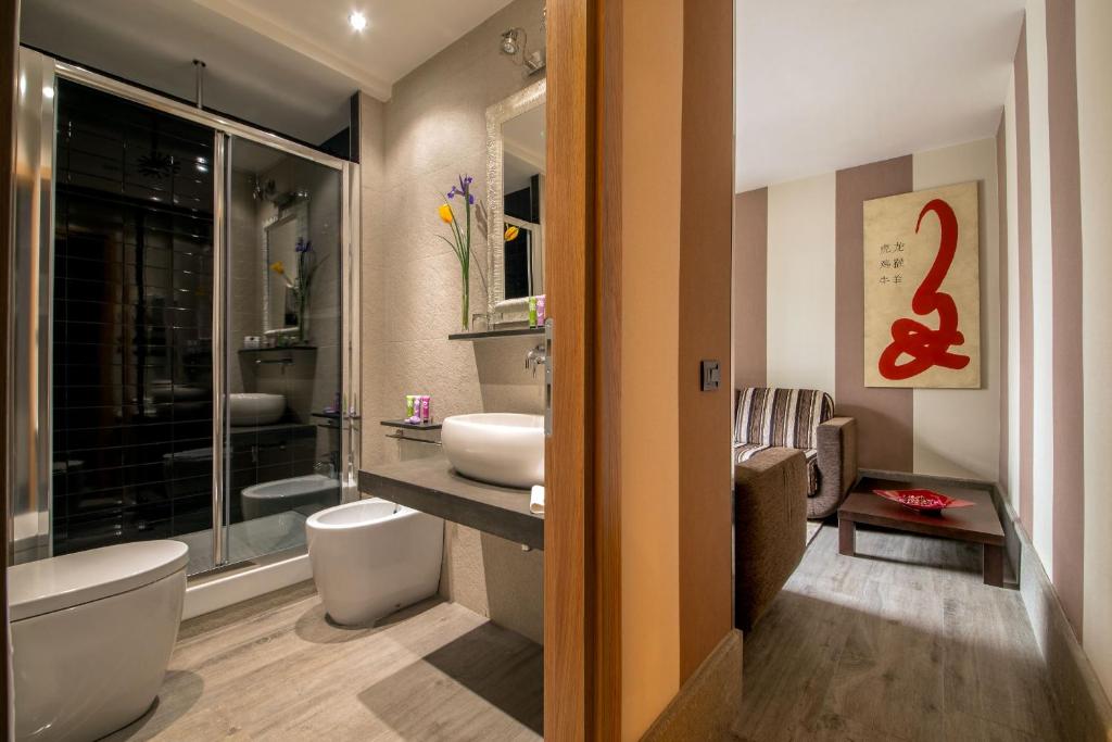 Koupelna v ubytování Hotel Ariston