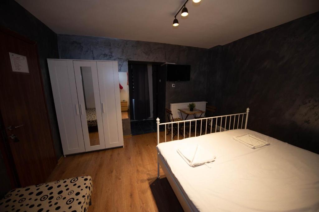 Postel nebo postele na pokoji v ubytování Vila Estera Therme Balotesti