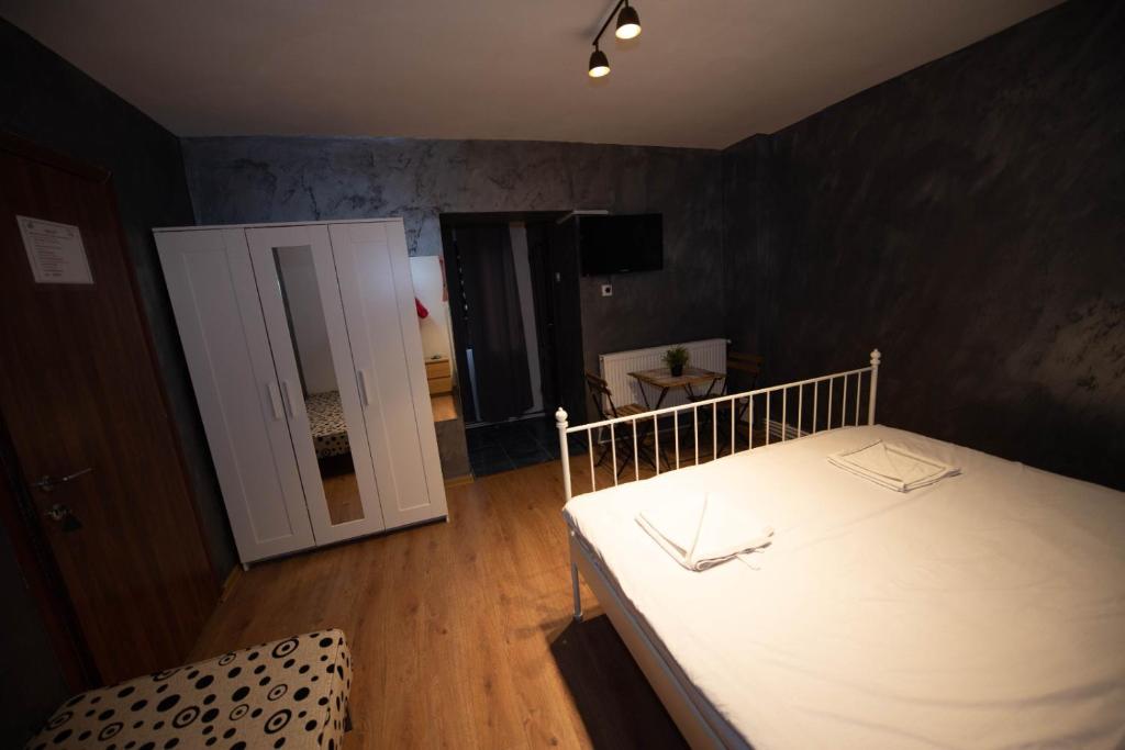 Postel nebo postele na pokoji v ubytování Vila Estera Therme Balotesti