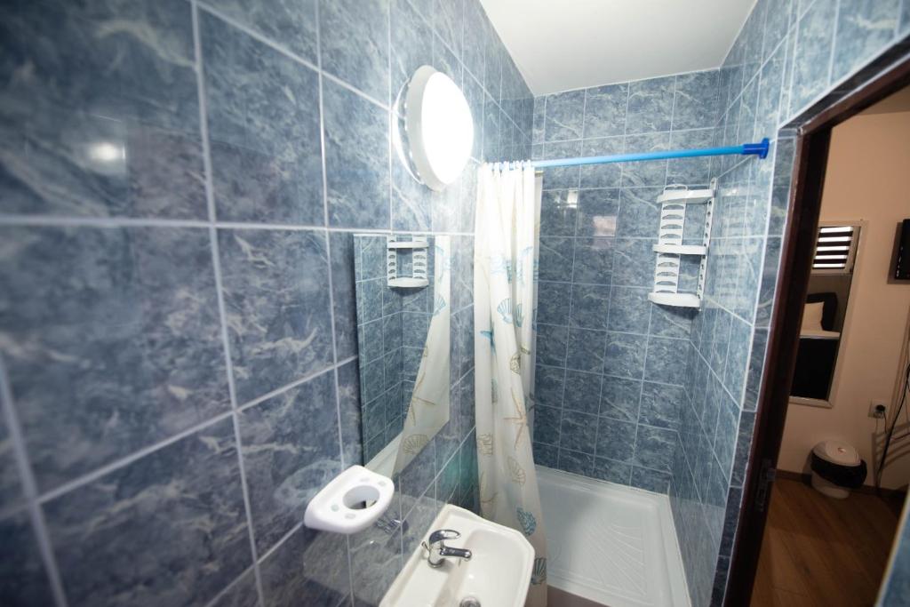 Koupelna v ubytování Vila Estera Therme Balotesti