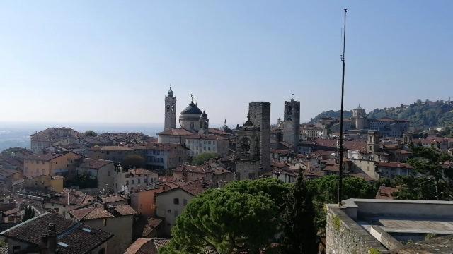 a view of a city with buildings and mosques at B&B Sotto le Mura in Bergamo
