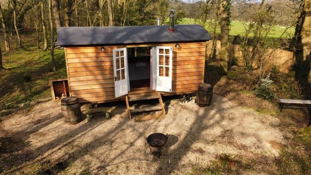 an aerial view of a small house in the woods at Bluebell shepherds Hut in Rolvenden
