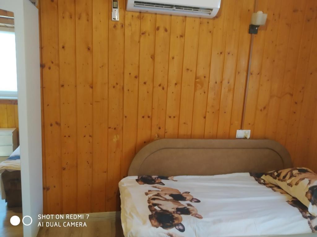 Posteľ alebo postele v izbe v ubytovaní Rozalia