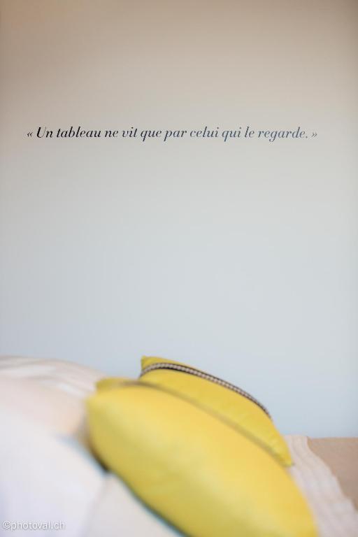Postel nebo postele na pokoji v ubytování Martigny Boutique-Hôtel