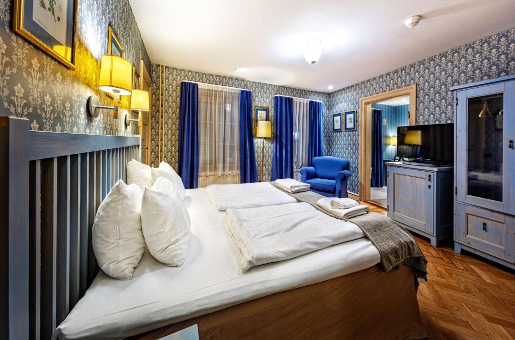 TV a/nebo společenská místnost v ubytování Best Western Hotel Royal