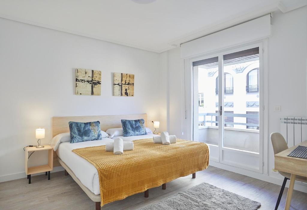 Posteľ alebo postele v izbe v ubytovaní Victorina by Basque Homes