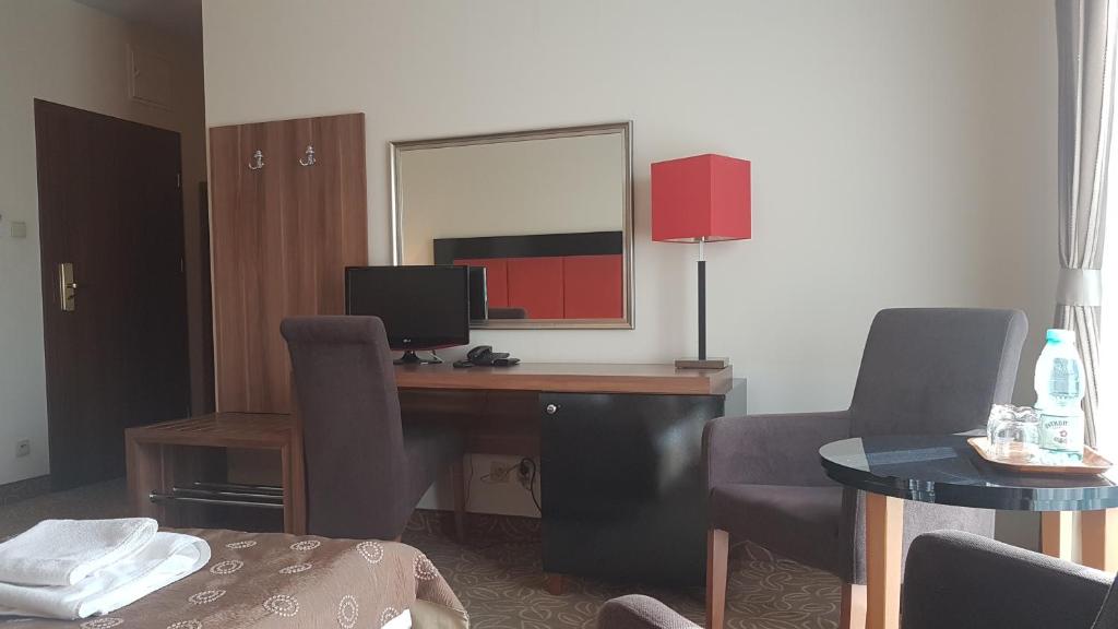 TV a/nebo společenská místnost v ubytování Hotel Cyprus