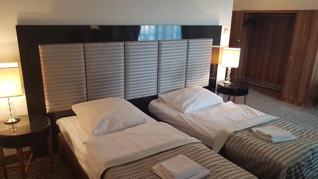 Postel nebo postele na pokoji v ubytování Hotel Cyprus