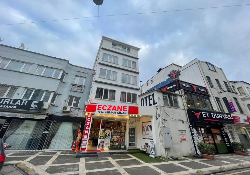 a group of buildings on a city street at Meydan Pansiyon Uskudar in Istanbul