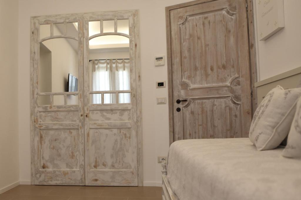 Postel nebo postele na pokoji v ubytování Casa Fioravanti