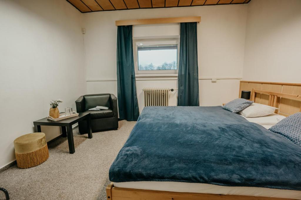 Postel nebo postele na pokoji v ubytování U Ztraceného potoka