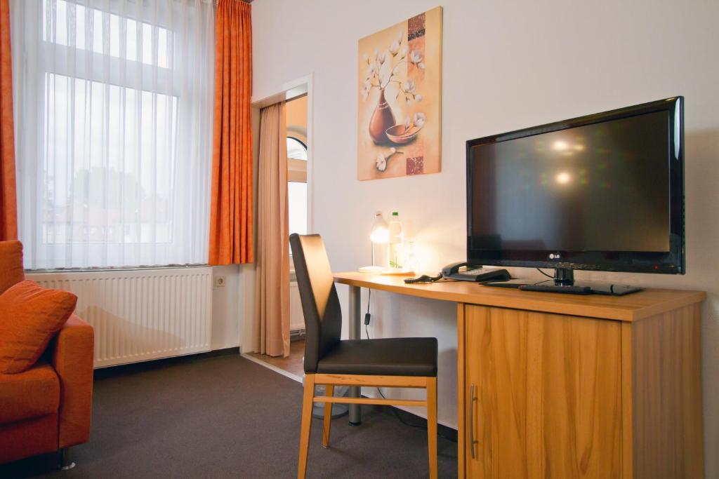 TV a/nebo společenská místnost v ubytování Hotel Schaper