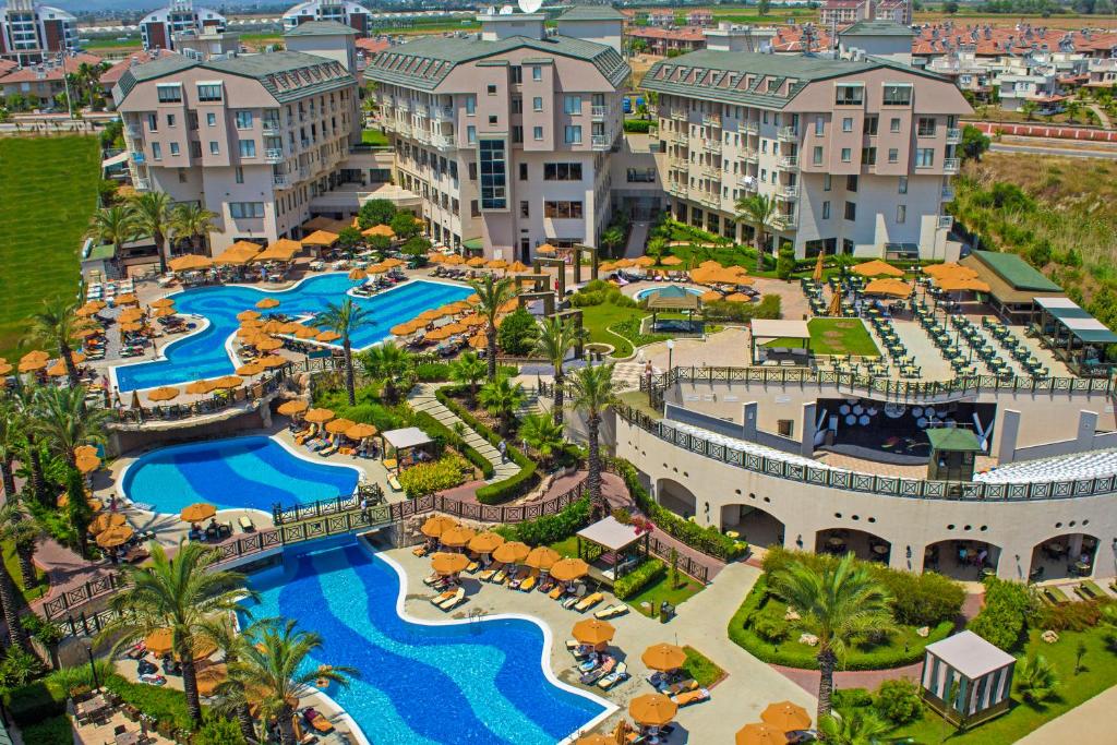 an aerial view of a resort with a pool at Novum Garden Side Hotel in Side