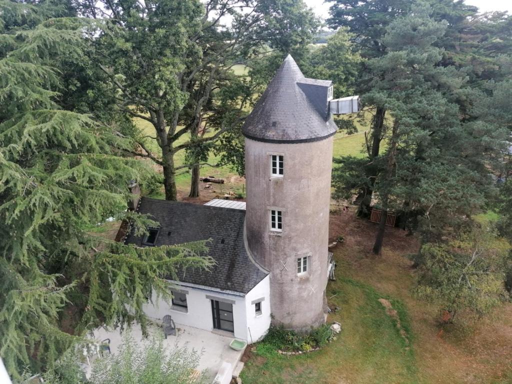 an aerial view of a house with a tower at Le moulin de La Retardière in Orvault