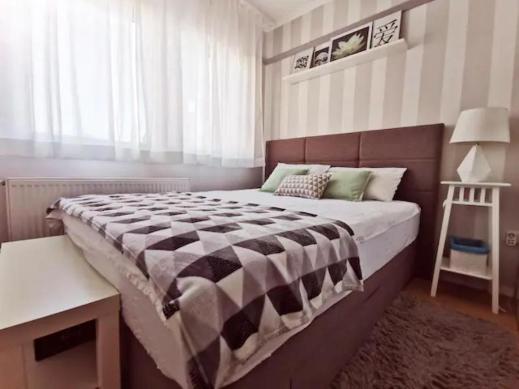 Posteľ alebo postele v izbe v ubytovaní New elegant apartment with free parking and wifi