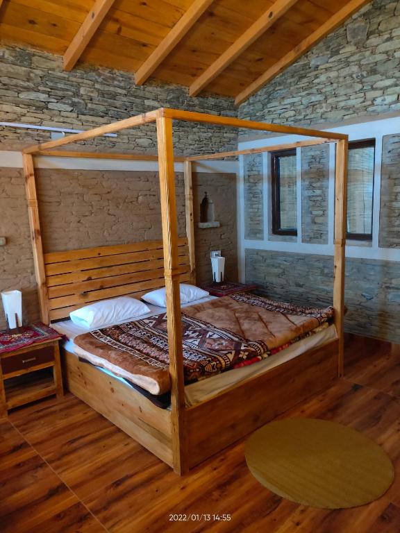 Postel nebo postele na pokoji v ubytování Meraki Huts