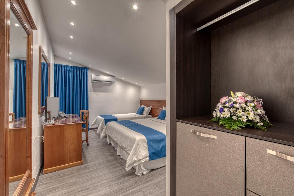 Swans Cay Hotel - Habitación Triple Estándar
