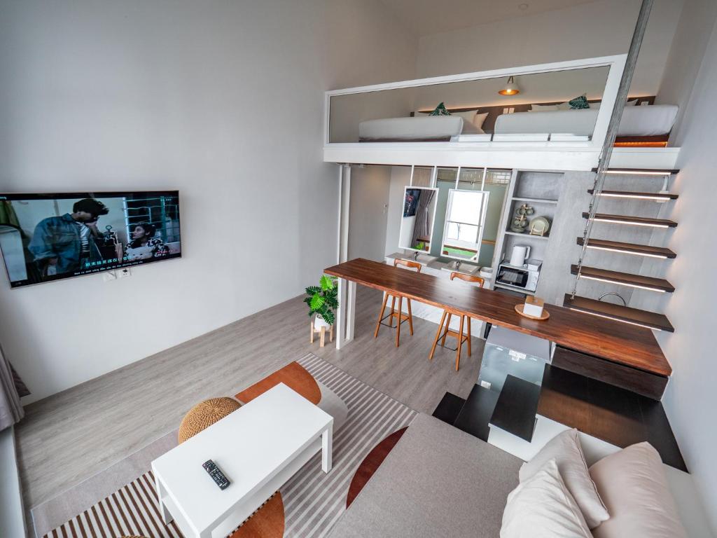 TV a/nebo společenská místnost v ubytování Ease Me Residence