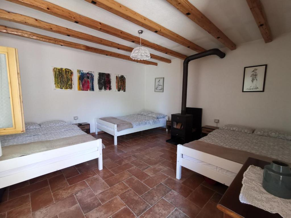 Postel nebo postele na pokoji v ubytování VILA RIRA - Rrajcë, Shebenik