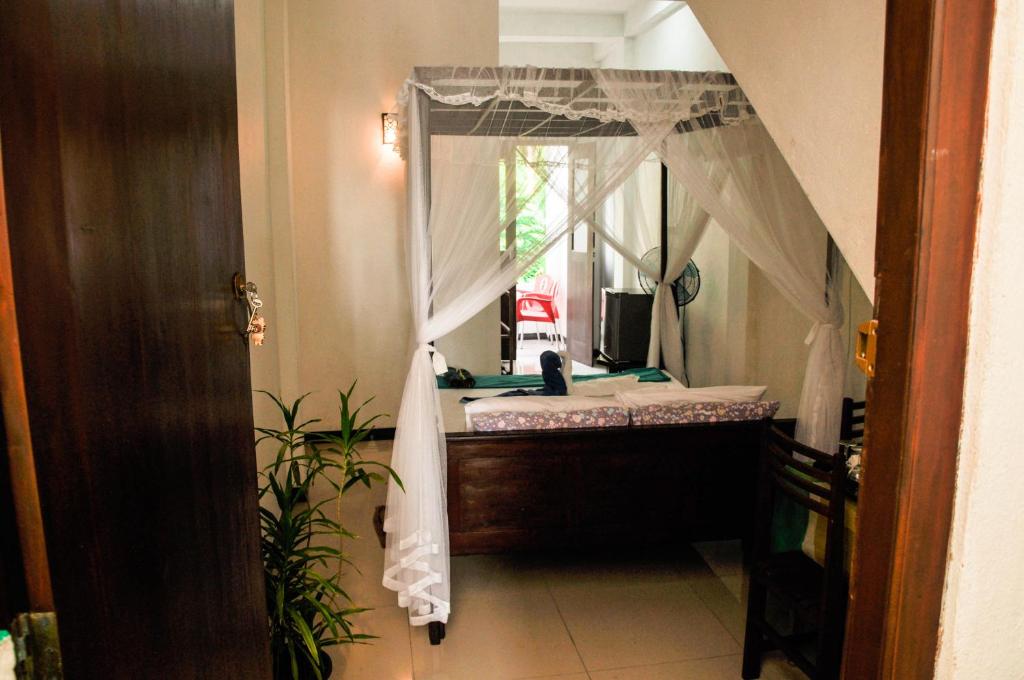 Voodi või voodid majutusasutuse Gem Light Guest House toas