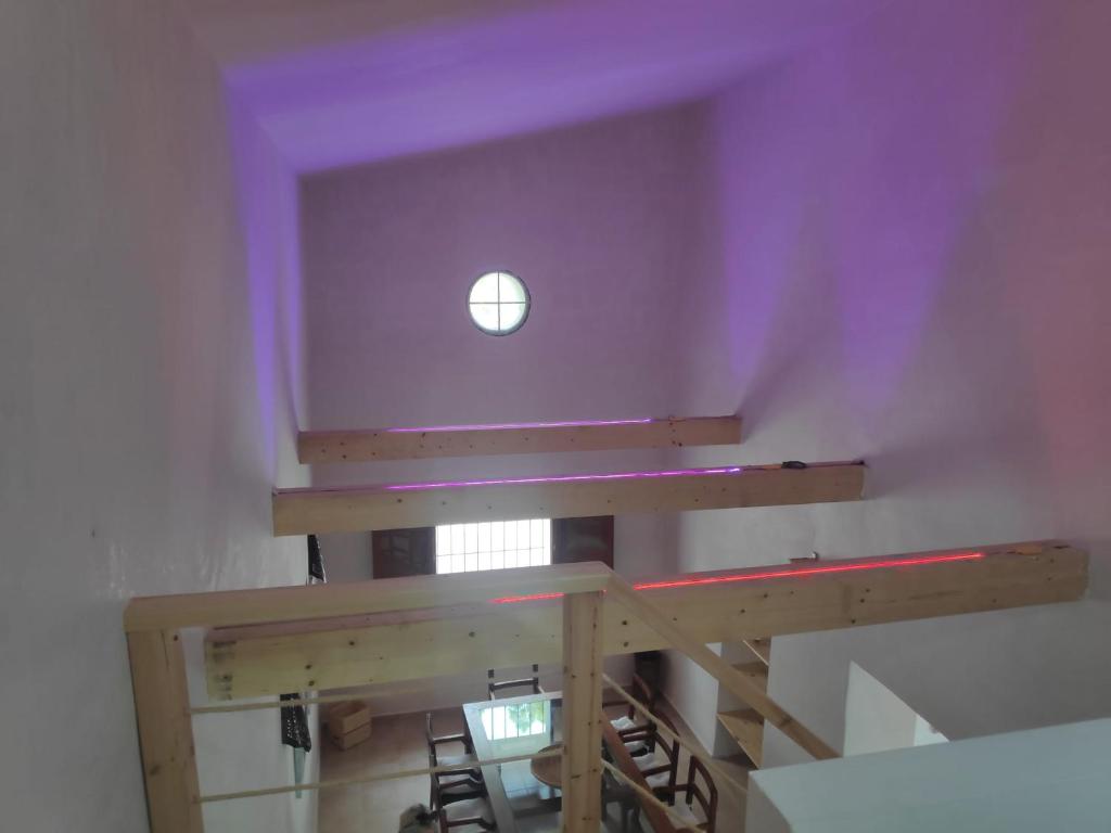 Postel nebo postele na pokoji v ubytování Casa Teatro RAÍCES