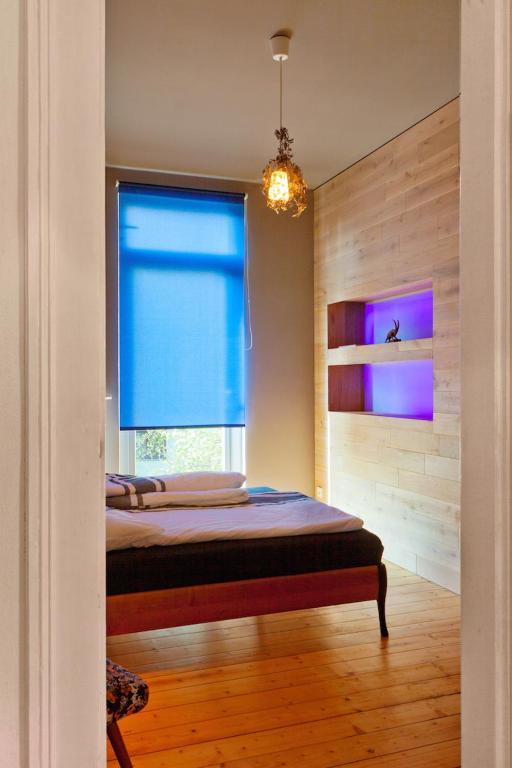 Postel nebo postele na pokoji v ubytování Design Apartments "Hier war Goethe nie"