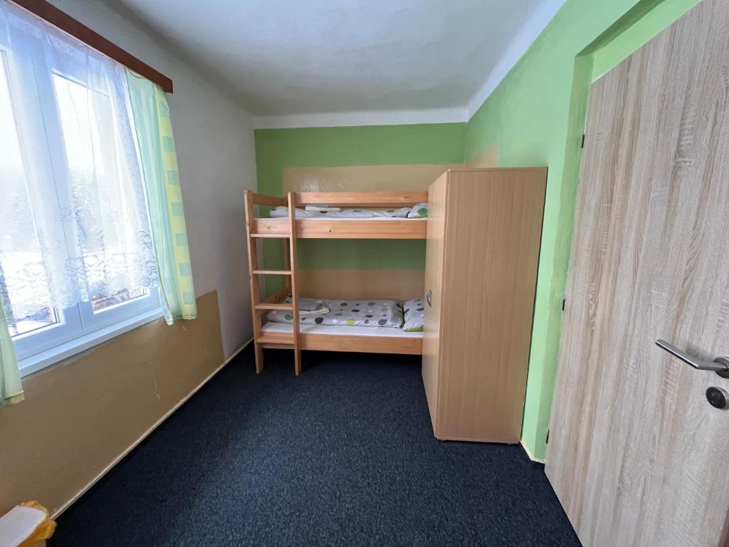 Postel nebo postele na pokoji v ubytování Pension Martinské údolí - dependance