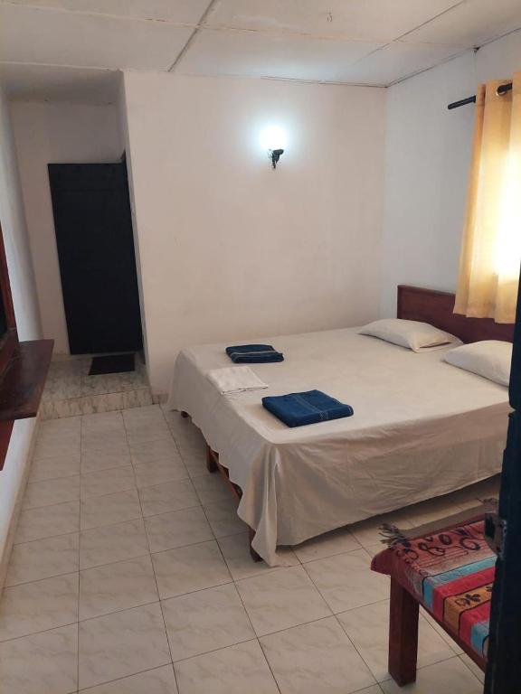 Postel nebo postele na pokoji v ubytování Hansa Surf Hotel