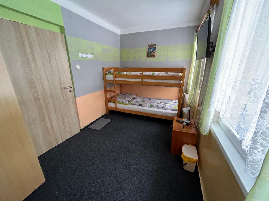 Postel nebo postele na pokoji v ubytování Pension Martinské údolí - dependance