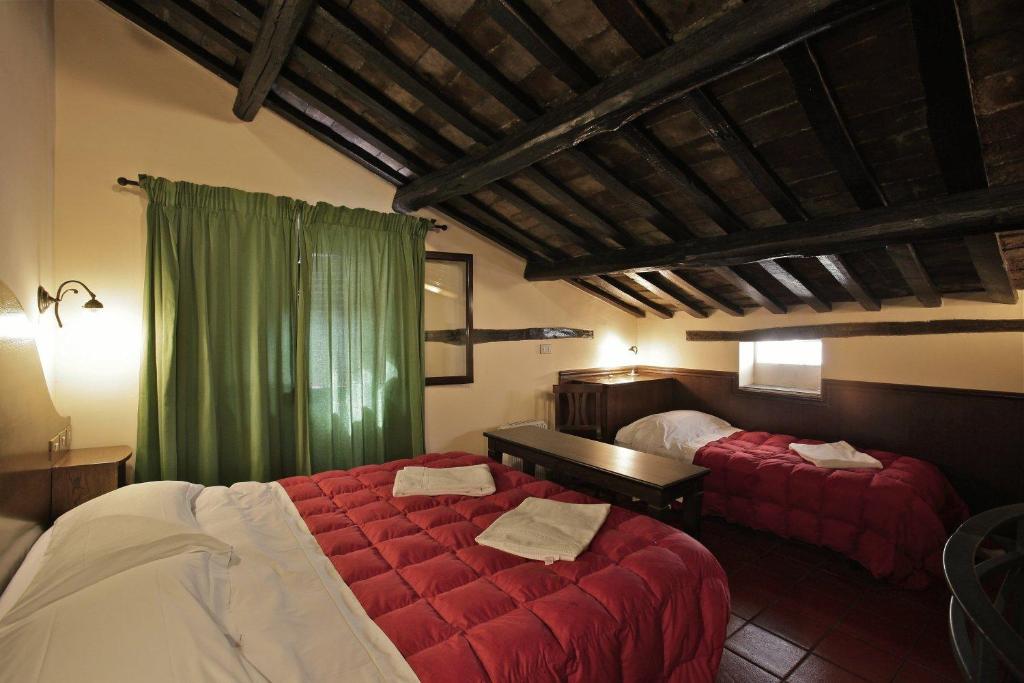 Postel nebo postele na pokoji v ubytování Hotel Panda