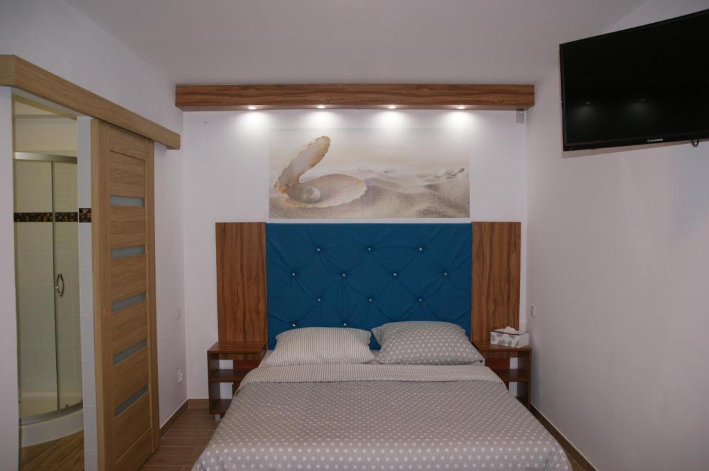 Postel nebo postele na pokoji v ubytování Holiday Amber -