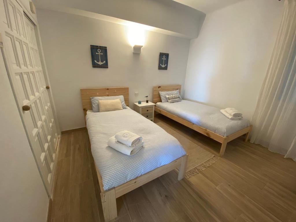 A bed or beds in a room at Casa 24
