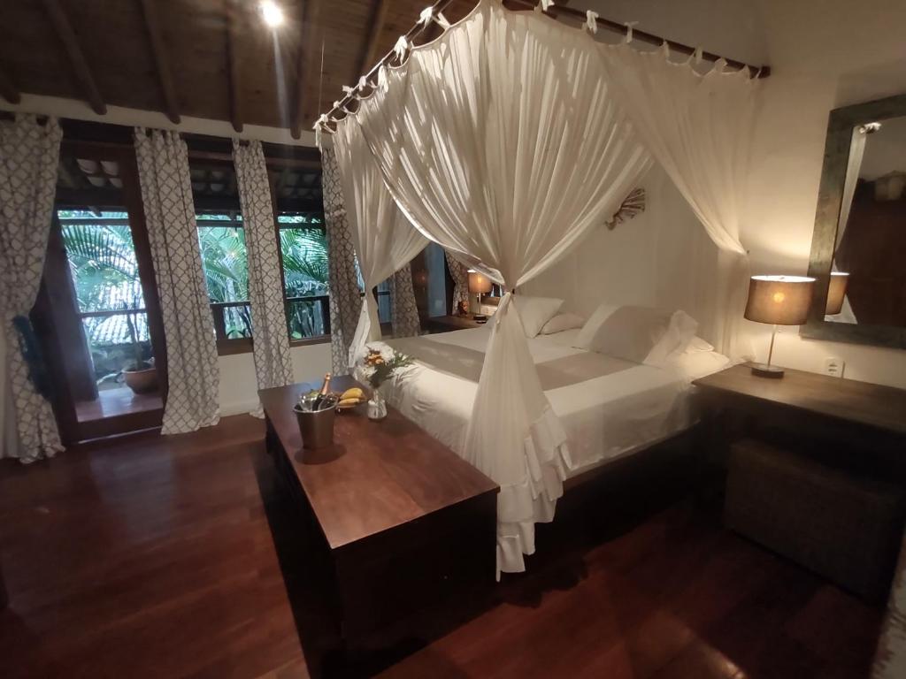 Postel nebo postele na pokoji v ubytování Monkey Casa Hotel