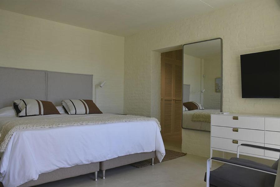 Postel nebo postele na pokoji v ubytování Posada Tamarindo