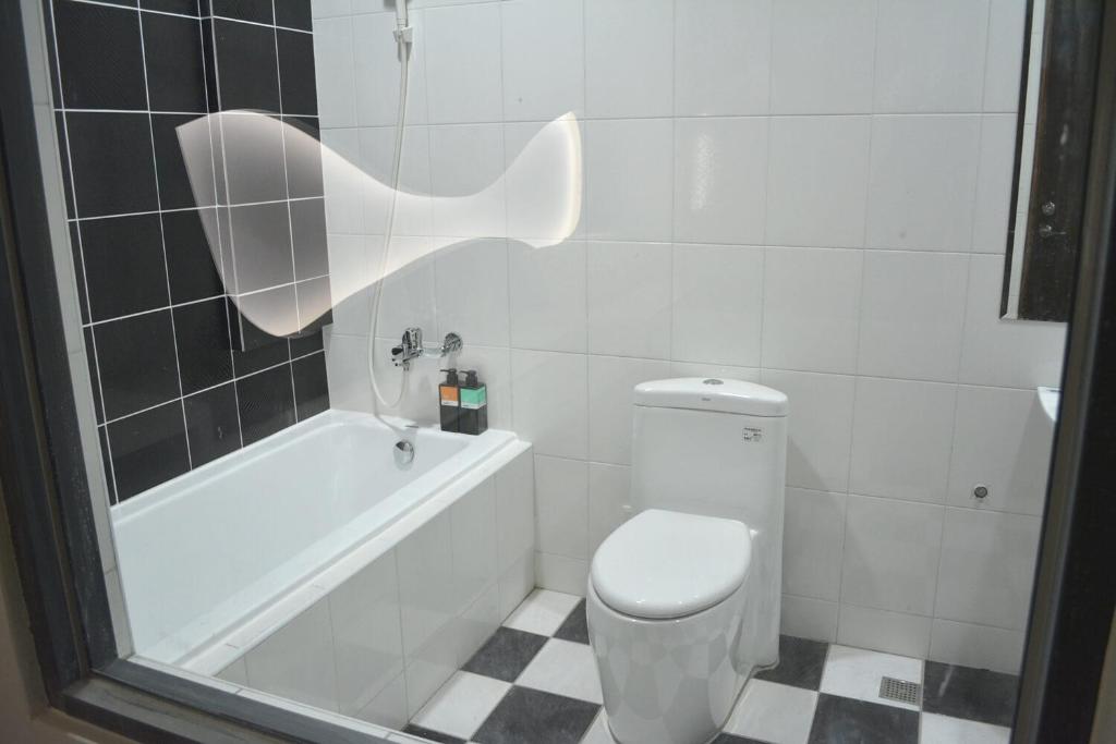 Koupelna v ubytování CoCo Motel Boutique