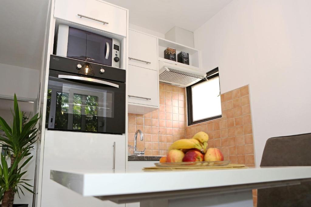Kuchyňa alebo kuchynka v ubytovaní Apartment ADAM