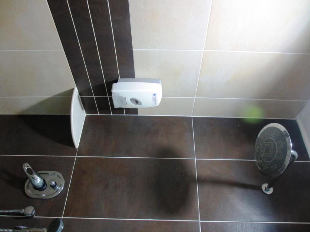 Koupelna v ubytování Sanbay Hotel