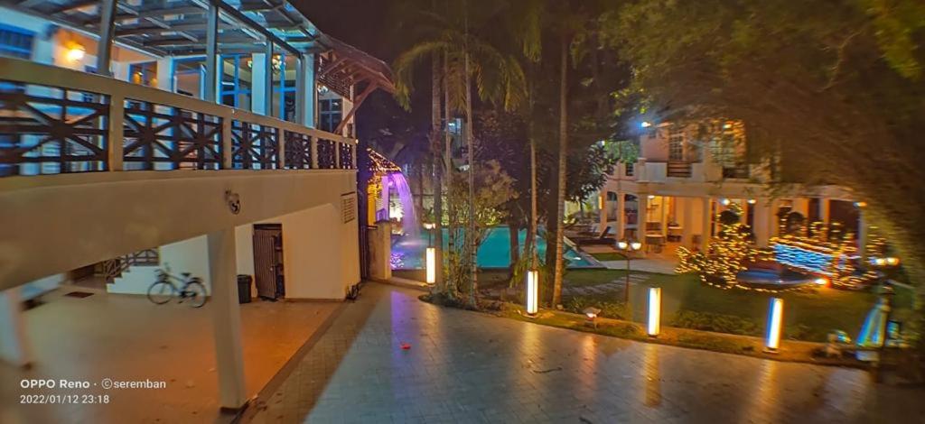 a view of a building at night with lights at Seremban Grande Villa 163 by Vale Pine in Seremban