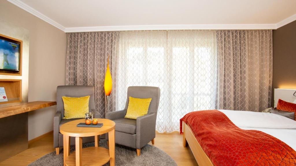 Postel nebo postele na pokoji v ubytování Hotel St. Florian