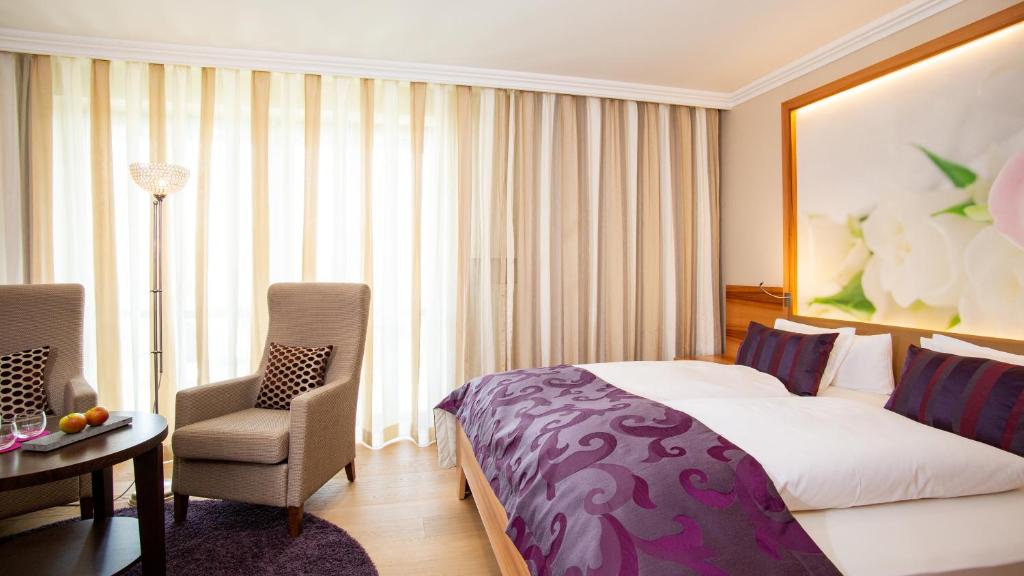 Postel nebo postele na pokoji v ubytování Hotel St. Florian