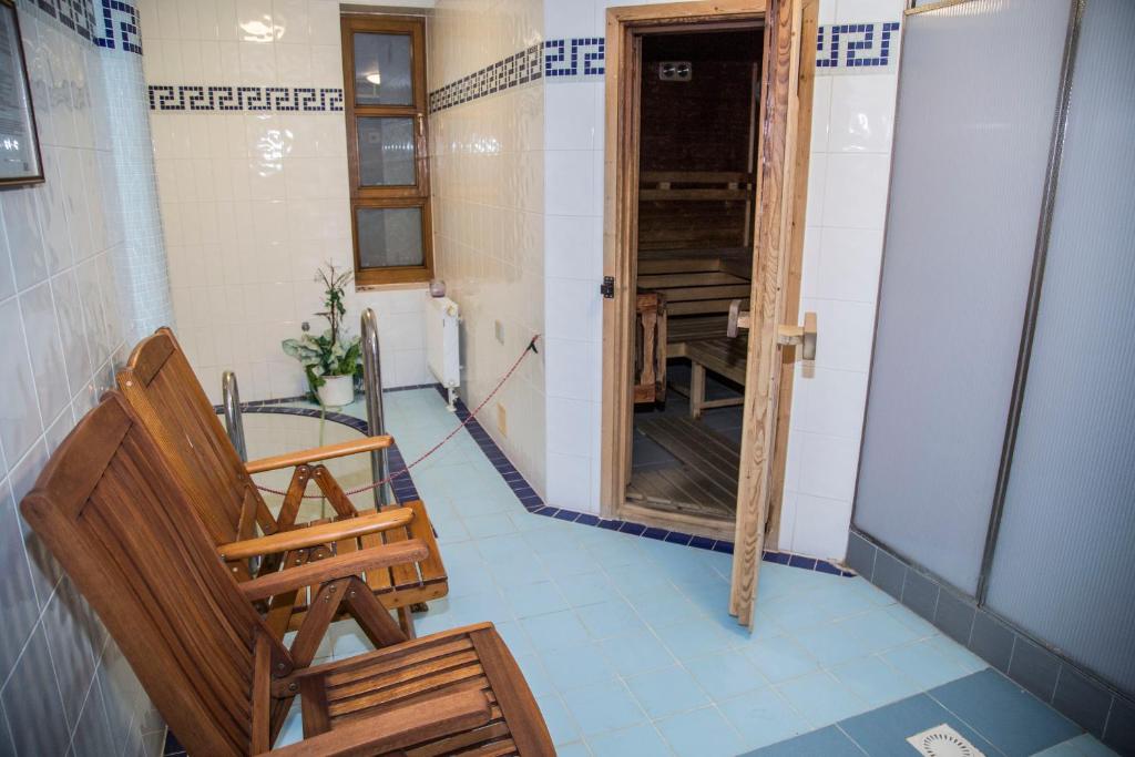 Posezení v ubytování YURA hotel Čeladná BAZÉN A SAUNY ZDARMA