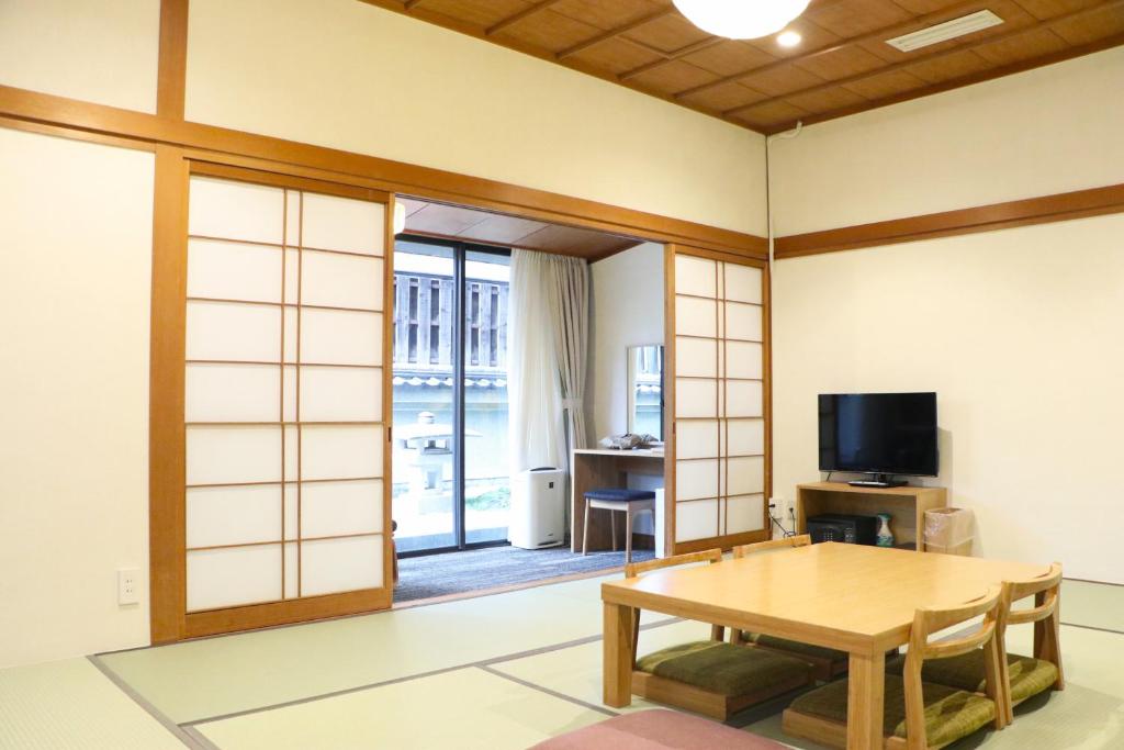 TV a/nebo společenská místnost v ubytování Hotel Gran Ms Kyoto