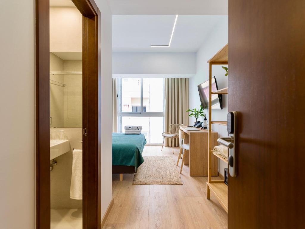 Postel nebo postele na pokoji v ubytování Hotel Emeté & Coworking by airnest